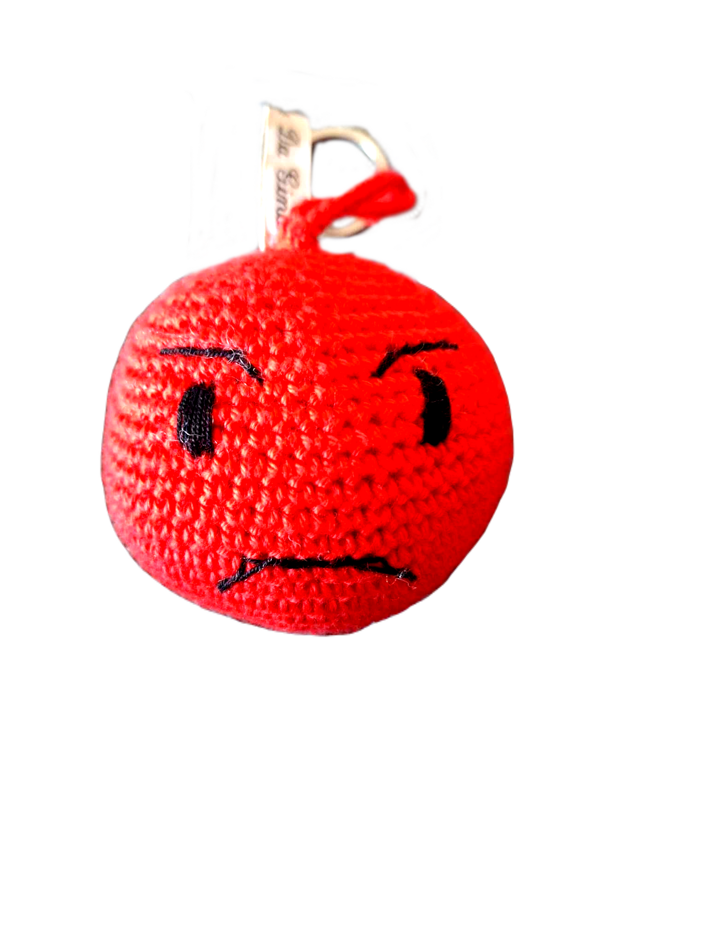 Porta Chaves com o formato do emoji "Zangado". Este é redondo e completamente vermelho, com exceção da boca, olhos e sobrancelhas que são da cor preta.