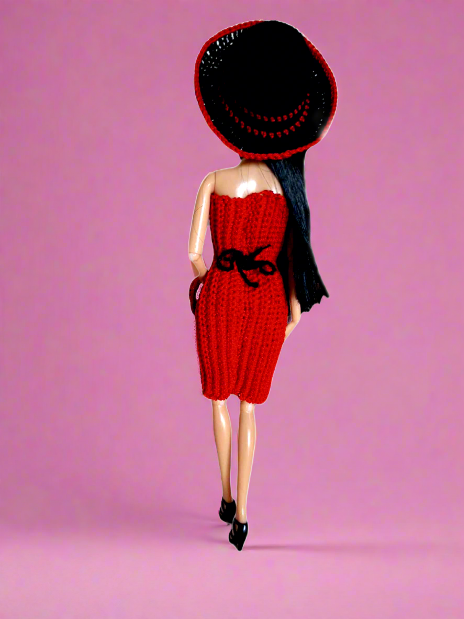 Parte de trás do vestido para se destacar o pormenor do laço a volta da cintura.