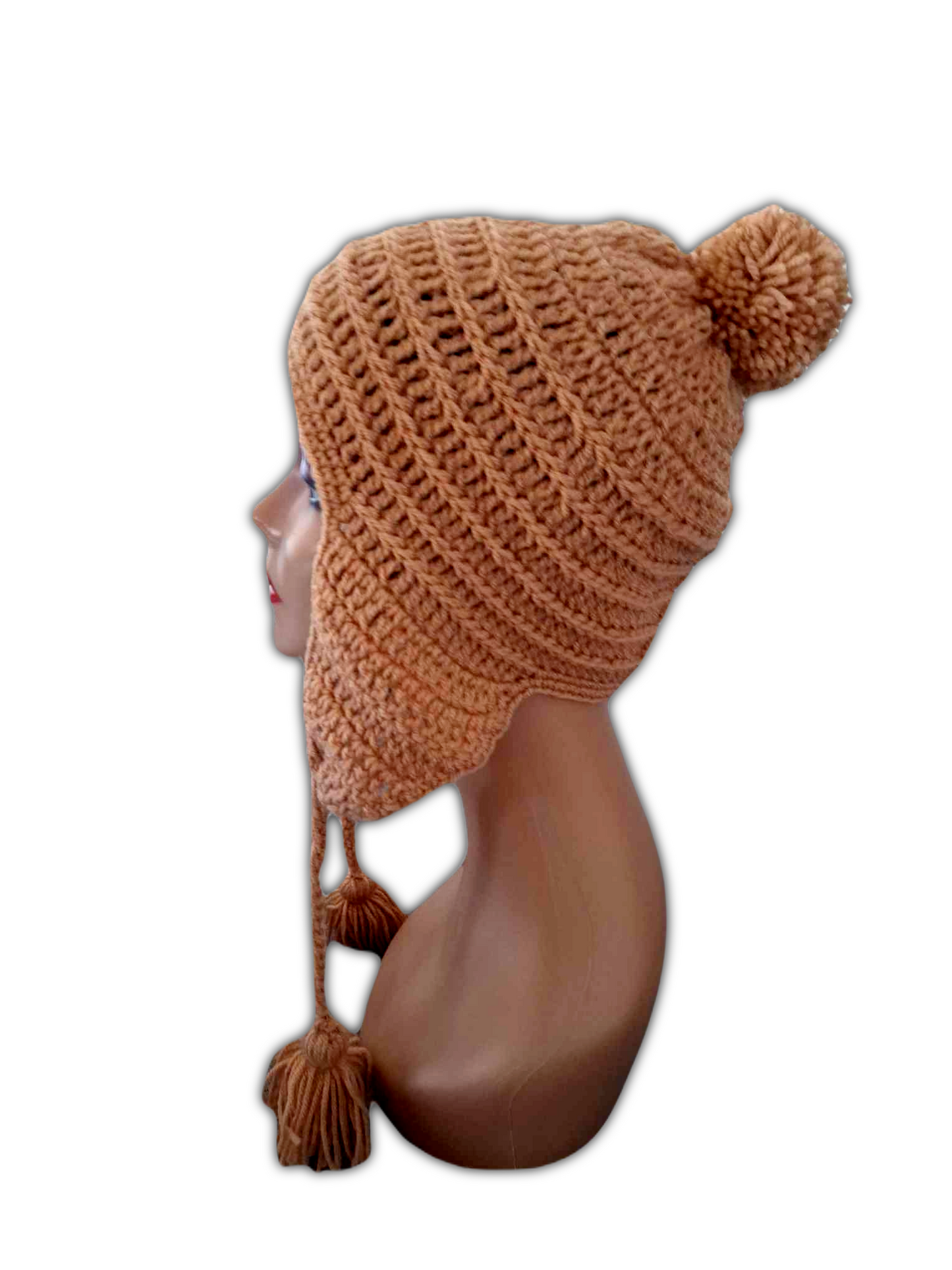 Vista lateral do gorro no manquim. Aqui podemos ver com mais detalhe o tapa orelhas e ainda o  pompom que este tem no topo. 