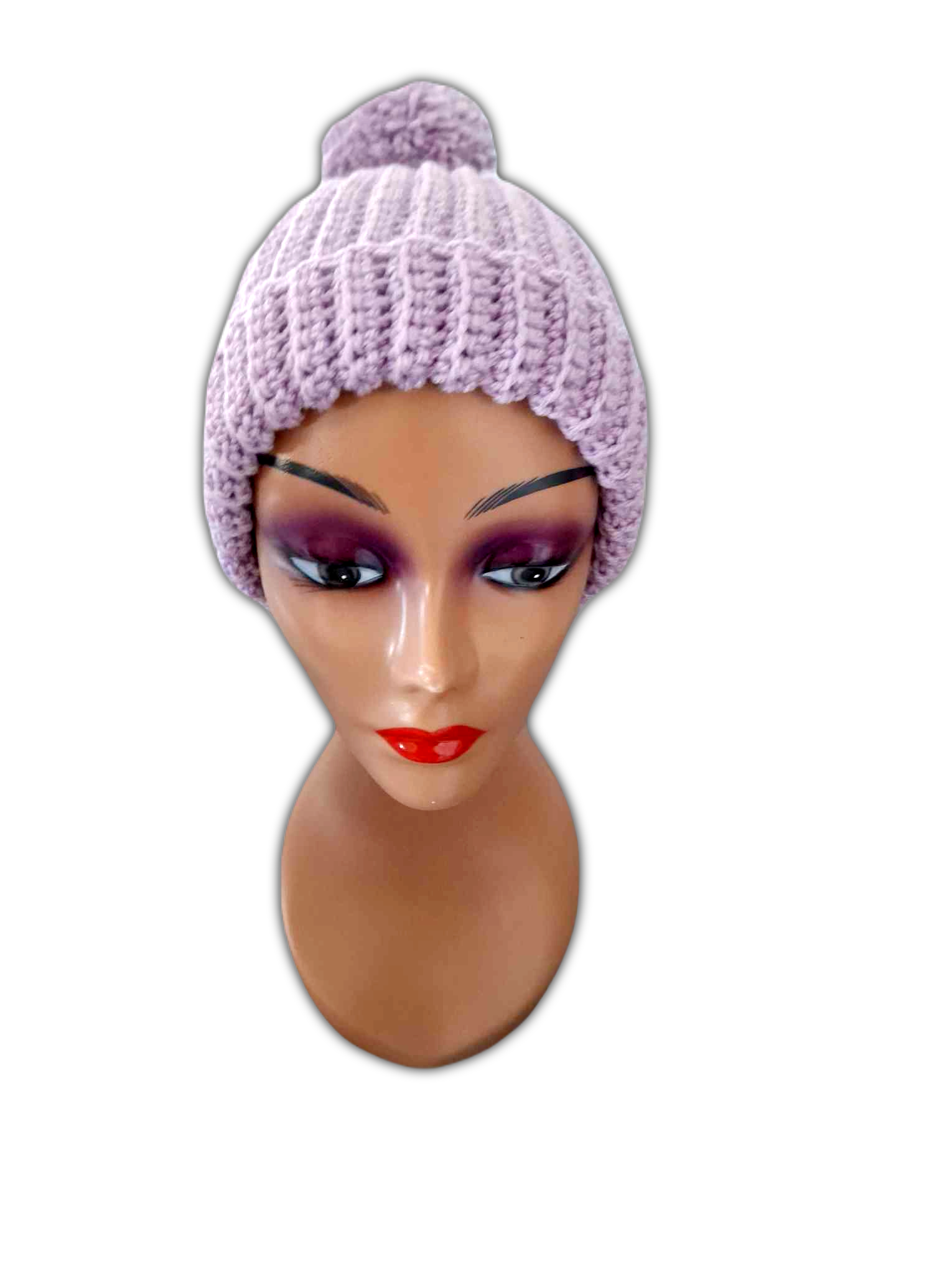 Outro angulo do gorro, para realçar o pormenor do seu padrão e ainda o pompom que tem no topo.